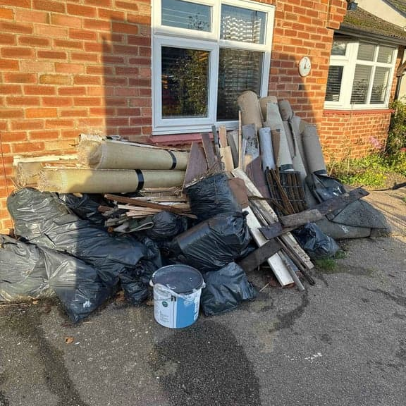 Large builder's skip with 8 cubic yards capacity and 600kg limit for construction waste disposal