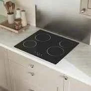 Hob Collect & Recycle service team safely removing old hob for recycling during kitchen renovation