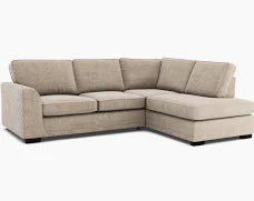 Beige sectional sofa on a white background